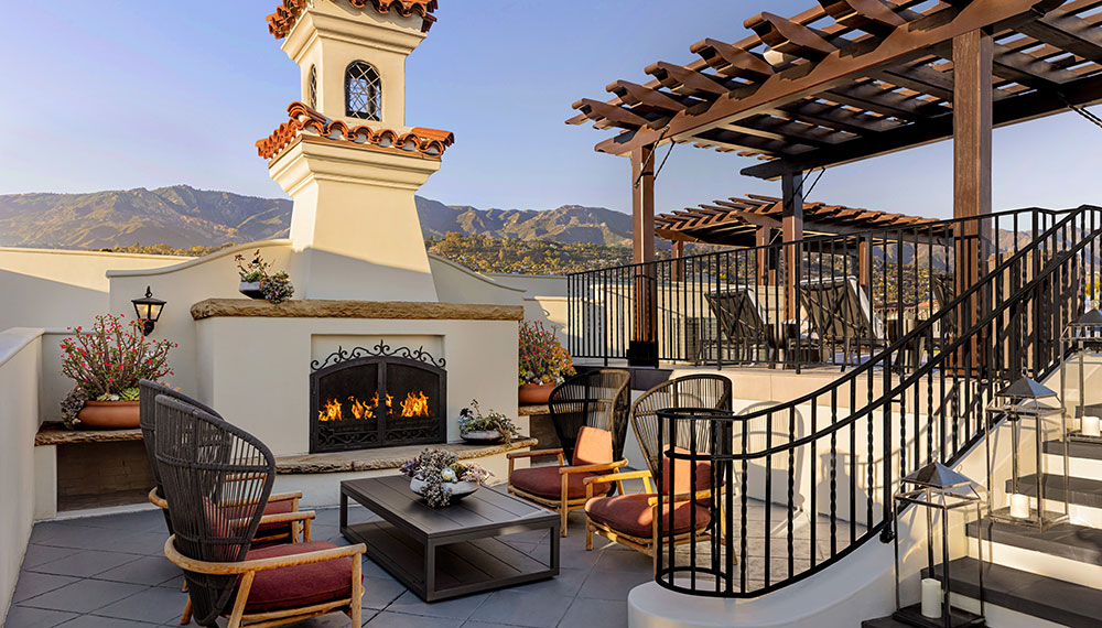 rooftop pool deck with fireplace