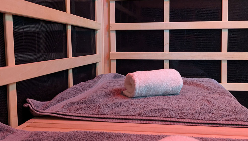 towels on a bench in a sauna
